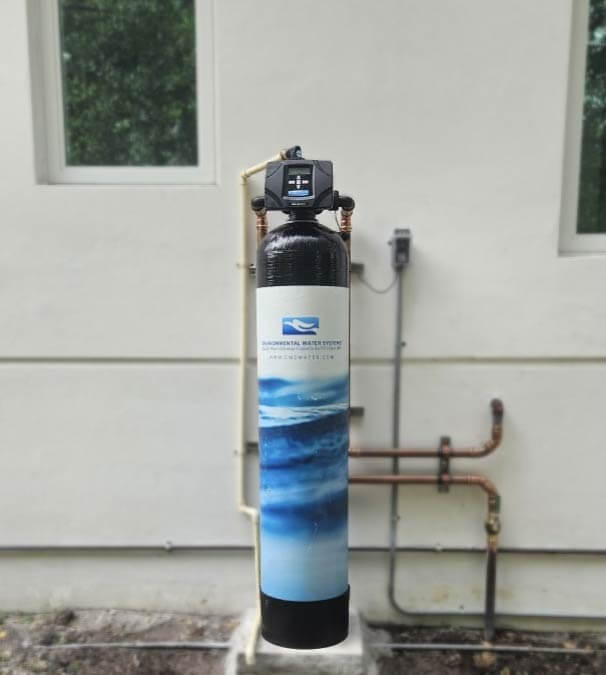Whole-house water purification system installed by Bob Hill Plumbing outside a Naples home.